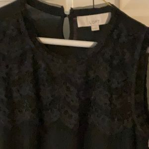Black sleeveless top with details